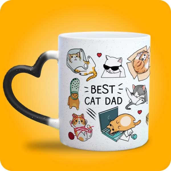 Біла чашка з написом "Best Dog Dad" і принтом кумедних собак, вигляд чашки хамелеон з ручкою сердечко